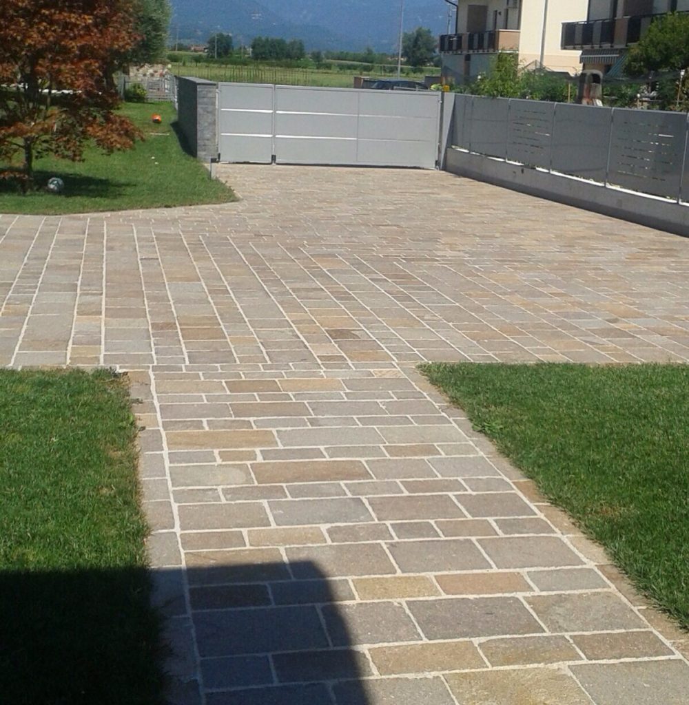 Outdoor porphyry floor tiles with sawn edges and rough surface